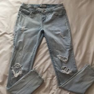 Women’s Mid Rise Distressed Skinny Jeans